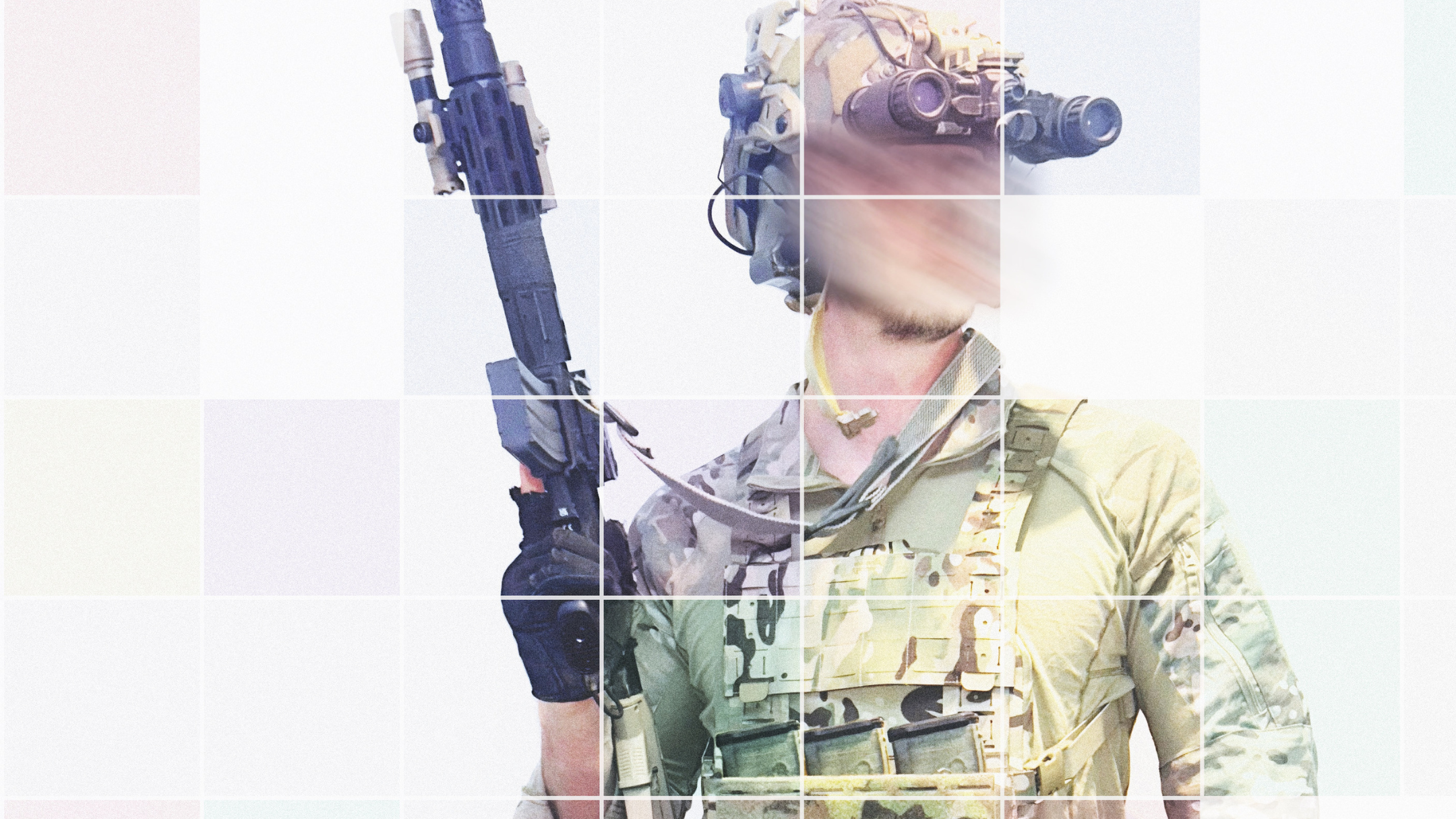 Front view of an operator posing in full tactical kit