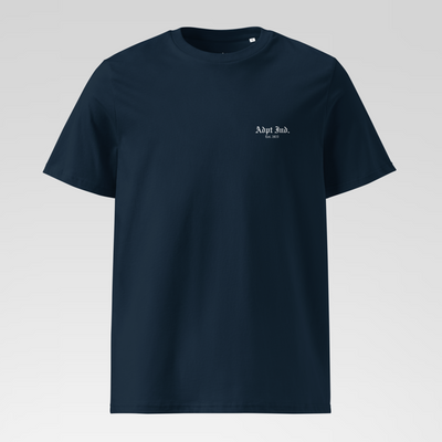Navy blue t-shirt with a small white logo on a light gray background
